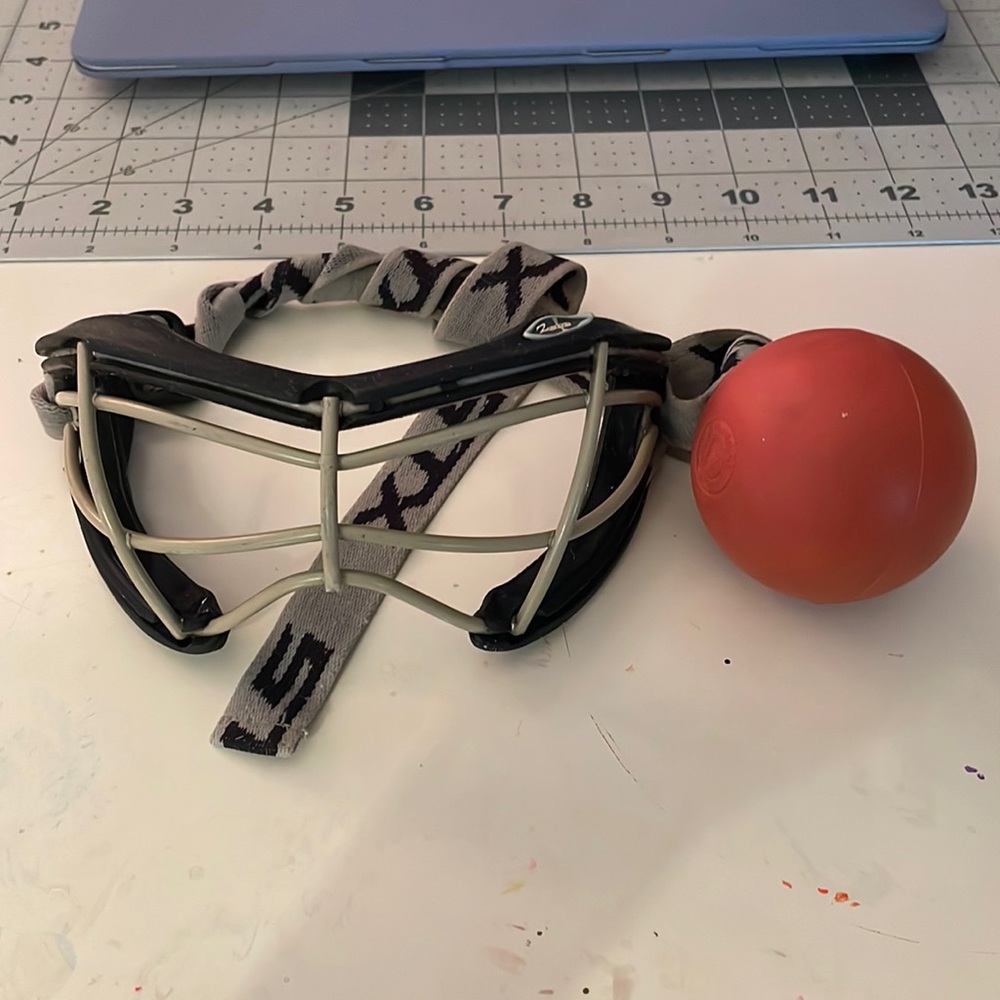 STX girls lacrosse goggles with ball